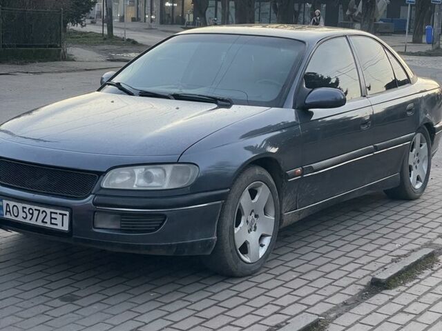 Серый Опель Омега, объемом двигателя 2 л и пробегом 350 тыс. км за 1800 $, фото 5 на Automoto.ua