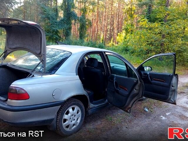 Сірий Опель Омега, об'ємом двигуна 2 л та пробігом 98 тис. км за 1300 $, фото 12 на Automoto.ua