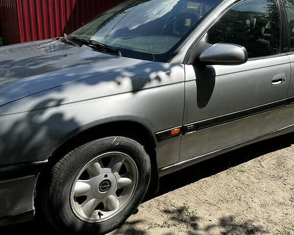 Серый Опель Омега, объемом двигателя 2.5 л и пробегом 308 тыс. км за 2500 $, фото 5 на Automoto.ua