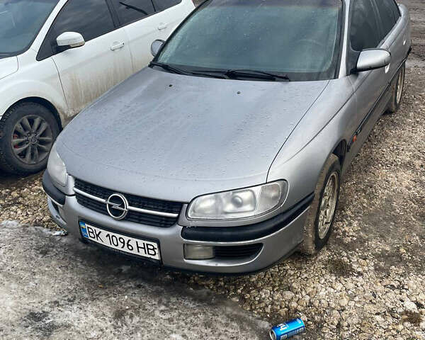 Серый Опель Омега, объемом двигателя 2 л и пробегом 300 тыс. км за 1500 $, фото 1 на Automoto.ua