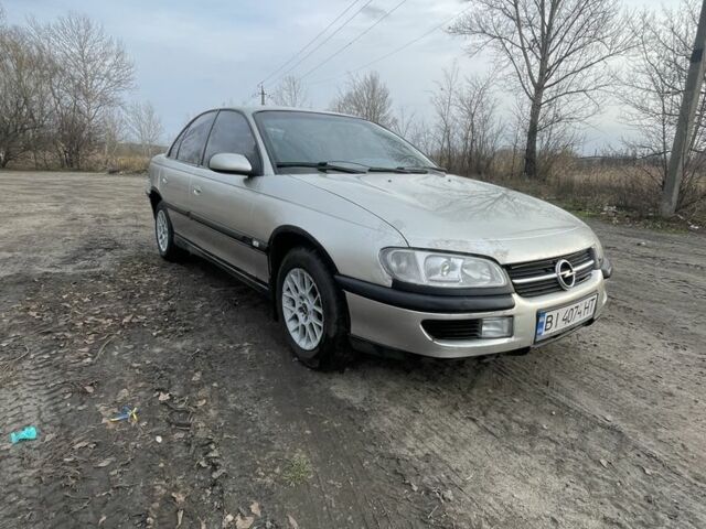 Сірий Опель Омега, об'ємом двигуна 2 л та пробігом 400 тис. км за 2000 $, фото 1 на Automoto.ua