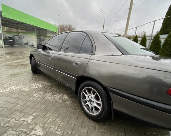 Сірий Опель Омега, об'ємом двигуна 2.5 л та пробігом 300 тис. км за 2300 $, фото 5 на Automoto.ua