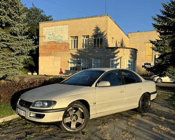 Серый Опель Омега, объемом двигателя 2.5 л и пробегом 462 тыс. км за 2800 $, фото 2 на Automoto.ua