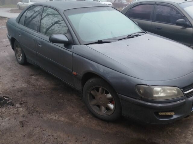 Серый Опель Омега, объемом двигателя 2.5 л и пробегом 345 тыс. км за 1300 $, фото 6 на Automoto.ua