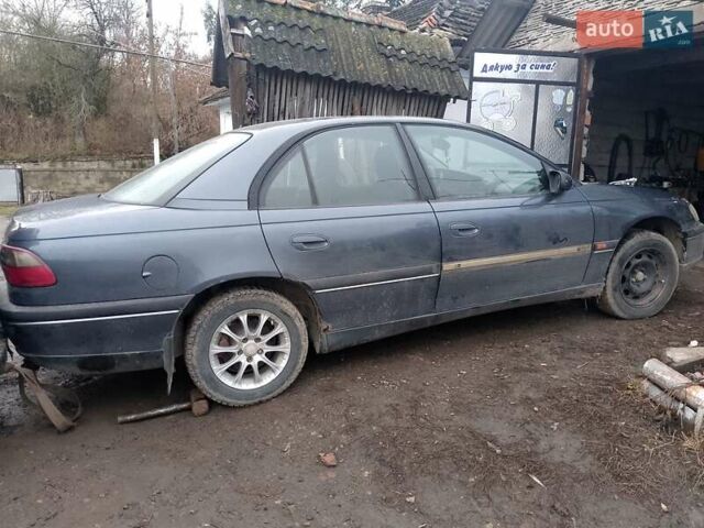 Серый Опель Омега, объемом двигателя 2.5 л и пробегом 100 тыс. км за 700 $, фото 5 на Automoto.ua