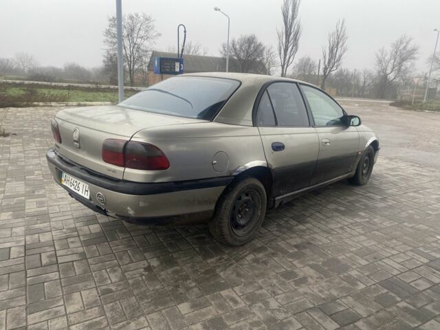 Серый Опель Омега, объемом двигателя 2 л и пробегом 250 тыс. км за 1450 $, фото 2 на Automoto.ua