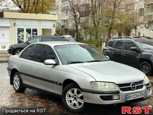 Серый Опель Омега, объемом двигателя 2.5 л и пробегом 300 тыс. км за 2000 $, фото 3 на Automoto.ua