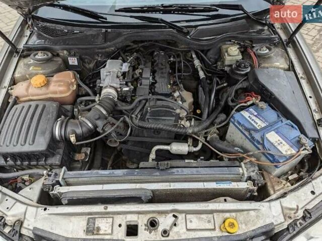 Серый Опель Омега, объемом двигателя 2 л и пробегом 400 тыс. км за 1900 $, фото 7 на Automoto.ua