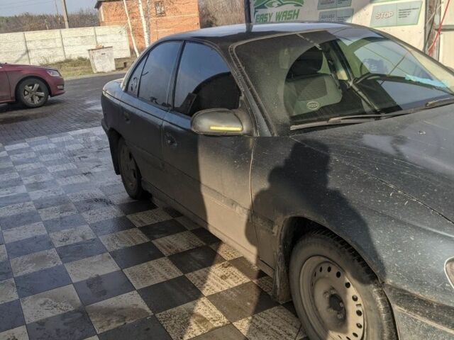 Серый Опель Омега, объемом двигателя 2 л и пробегом 430 тыс. км за 1300 $, фото 4 на Automoto.ua