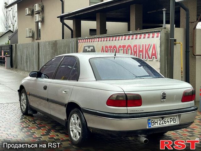 Серый Опель Омега, объемом двигателя 2.5 л и пробегом 300 тыс. км за 2000 $, фото 8 на Automoto.ua