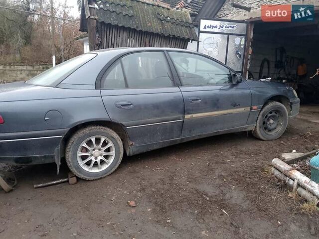 Серый Опель Омега, объемом двигателя 2.5 л и пробегом 100 тыс. км за 700 $, фото 4 на Automoto.ua