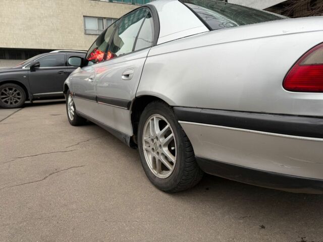 Серый Опель Омега, объемом двигателя 2 л и пробегом 278 тыс. км за 2400 $, фото 2 на Automoto.ua