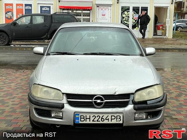 Серый Опель Омега, объемом двигателя 2.5 л и пробегом 300 тыс. км за 2000 $, фото 5 на Automoto.ua