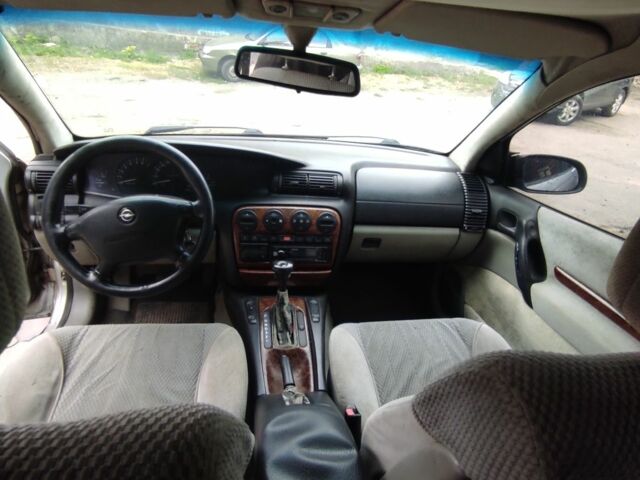 Сірий Опель Омега, об'ємом двигуна 2.5 л та пробігом 2 тис. км за 2399 $, фото 9 на Automoto.ua