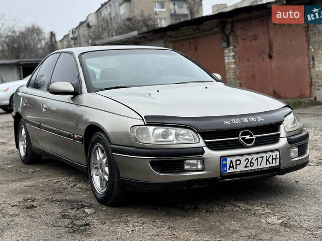 Серый Опель Омега, объемом двигателя 2 л и пробегом 297 тыс. км за 1950 $, фото 4 на Automoto.ua