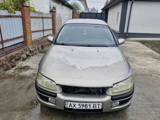 Серый Опель Омега, объемом двигателя 2.5 л и пробегом 321 тыс. км за 1100 $, фото 5 на Automoto.ua