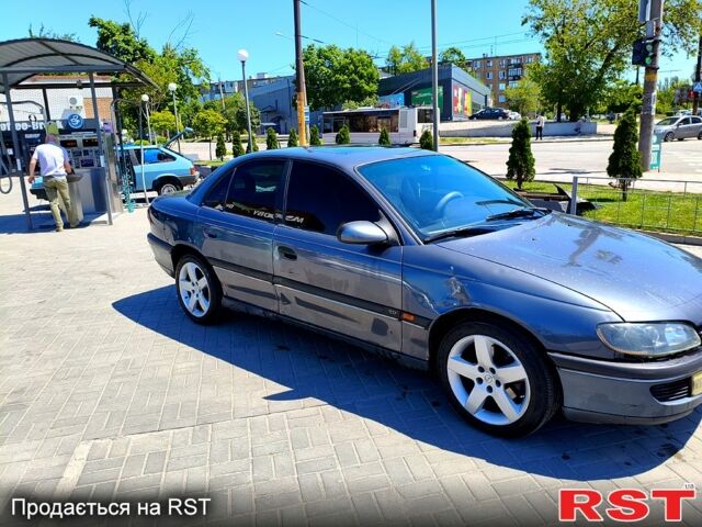 Серый Опель Омега, объемом двигателя 2.5 л и пробегом 446 тыс. км за 2800 $, фото 1 на Automoto.ua