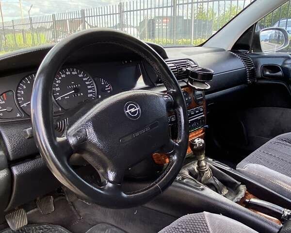 Серый Опель Омега, объемом двигателя 2 л и пробегом 250 тыс. км за 2500 $, фото 38 на Automoto.ua