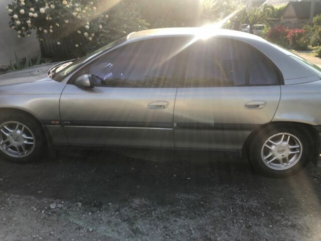 Серый Опель Омега, объемом двигателя 2 л и пробегом 293 тыс. км за 1700 $, фото 4 на Automoto.ua