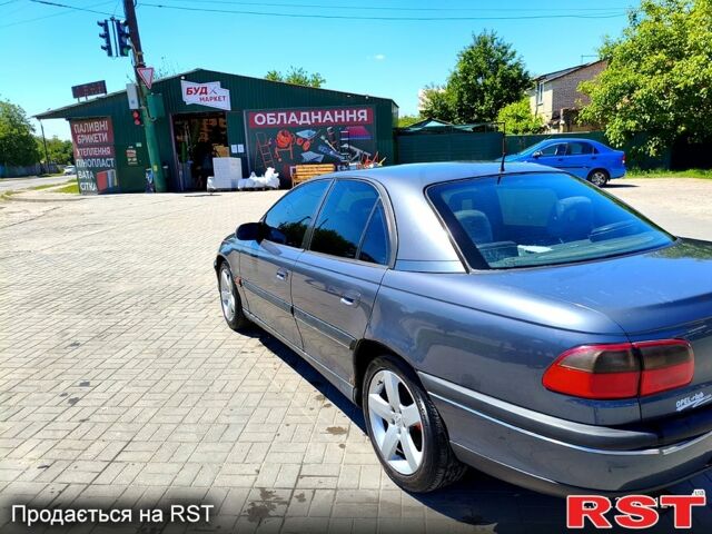 Серый Опель Омега, объемом двигателя 2.5 л и пробегом 446 тыс. км за 2800 $, фото 4 на Automoto.ua