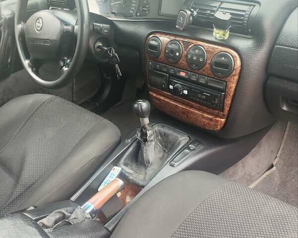 Серый Опель Омега, объемом двигателя 2.5 л и пробегом 300 тыс. км за 1700 $, фото 5 на Automoto.ua