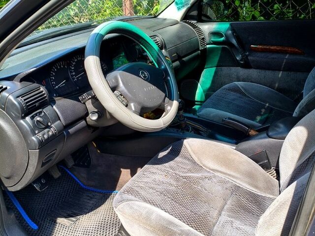 Серый Опель Омега, объемом двигателя 2.5 л и пробегом 446 тыс. км за 2800 $, фото 5 на Automoto.ua