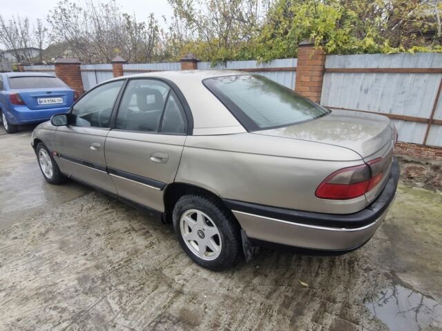 Серый Опель Омега, объемом двигателя 2.5 л и пробегом 321 тыс. км за 1100 $, фото 3 на Automoto.ua