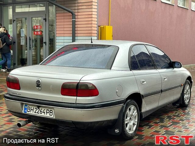 Серый Опель Омега, объемом двигателя 2.5 л и пробегом 300 тыс. км за 2000 $, фото 6 на Automoto.ua