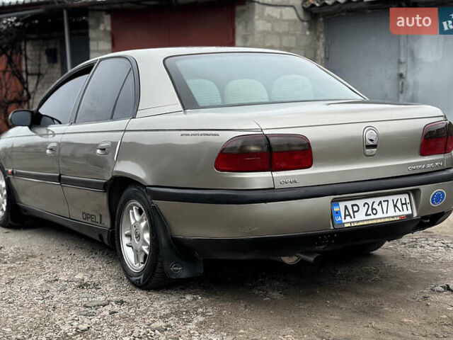 Серый Опель Омега, объемом двигателя 2 л и пробегом 297 тыс. км за 1950 $, фото 1 на Automoto.ua