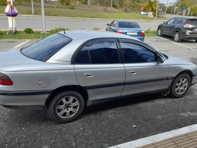 Сірий Опель Омега, об'ємом двигуна 2.5 л та пробігом 364 тис. км за 1000 $, фото 3 на Automoto.ua