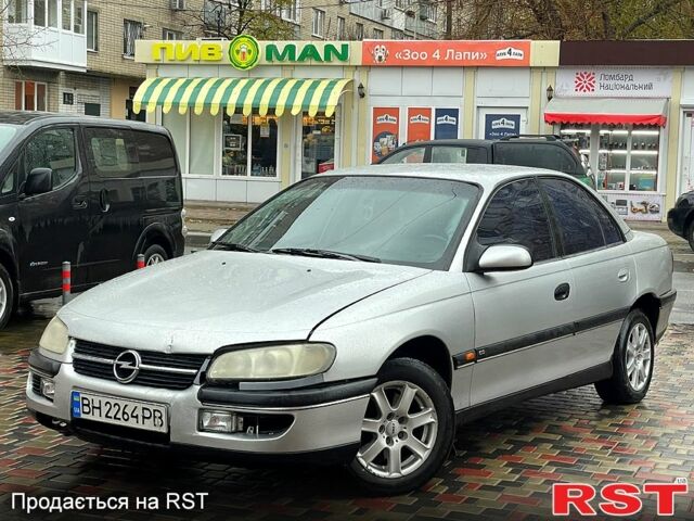 Серый Опель Омега, объемом двигателя 2.5 л и пробегом 300 тыс. км за 2000 $, фото 4 на Automoto.ua