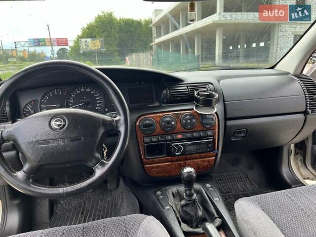 Серый Опель Омега, объемом двигателя 2 л и пробегом 250 тыс. км за 2500 $, фото 2 на Automoto.ua