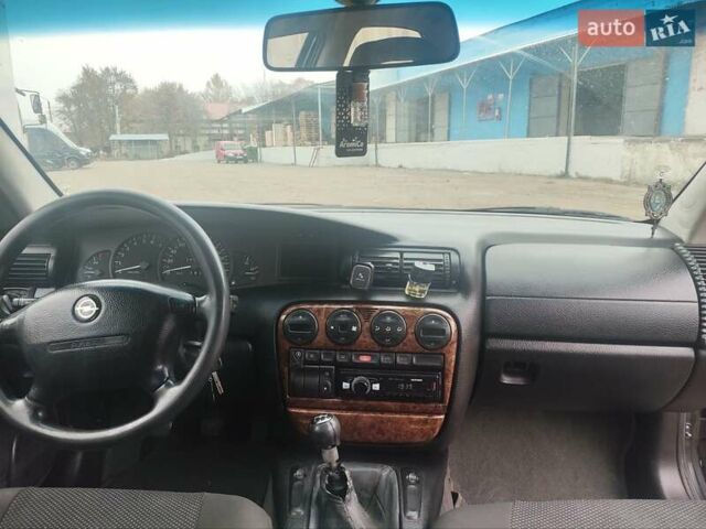 Серый Опель Омега, объемом двигателя 2.5 л и пробегом 300 тыс. км за 1700 $, фото 7 на Automoto.ua