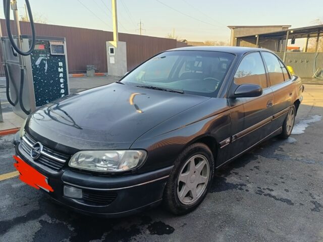 Сірий Опель Омега, об'ємом двигуна 2 л та пробігом 3 тис. км за 2000 $, фото 4 на Automoto.ua