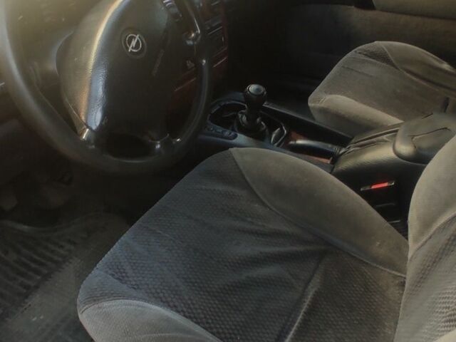 Серый Опель Омега, объемом двигателя 2 л и пробегом 350 тыс. км за 1200 $, фото 3 на Automoto.ua