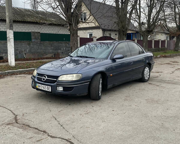 Серый Опель Омега, объемом двигателя 2 л и пробегом 235 тыс. км за 2600 $, фото 9 на Automoto.ua
