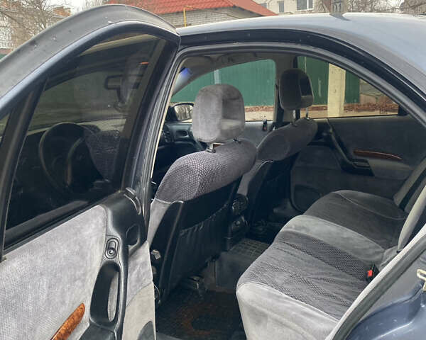 Серый Опель Омега, объемом двигателя 2 л и пробегом 235 тыс. км за 2600 $, фото 12 на Automoto.ua