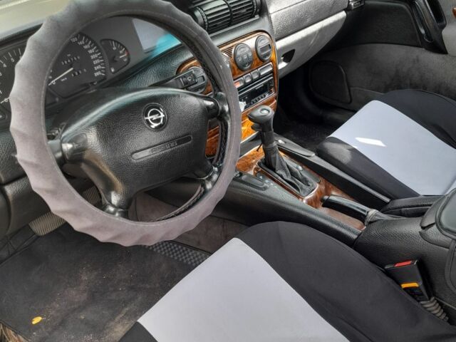 Сірий Опель Омега, об'ємом двигуна 2.5 л та пробігом 364 тис. км за 1000 $, фото 6 на Automoto.ua