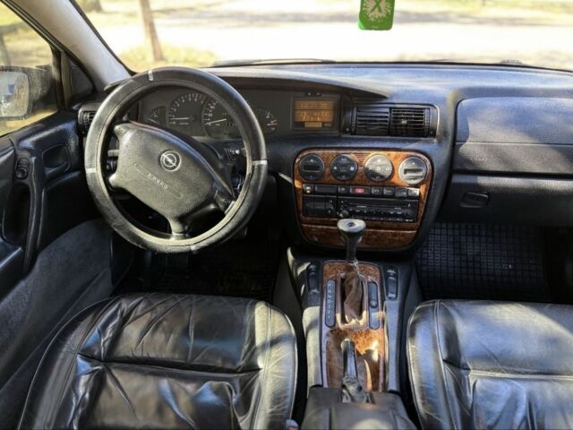 Серый Опель Омега, объемом двигателя 2.5 л и пробегом 2 тыс. км за 2000 $, фото 5 на Automoto.ua