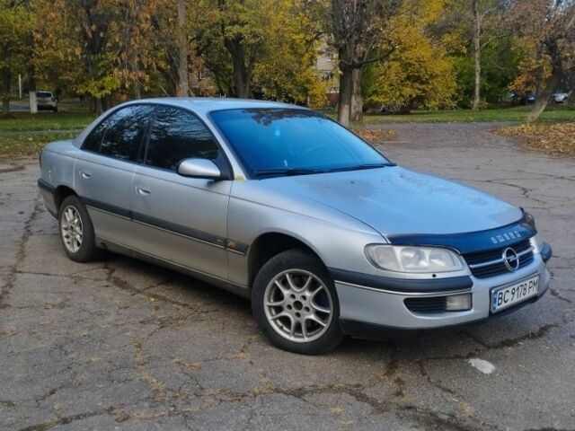 Сірий Опель Омега, об'ємом двигуна 2 л та пробігом 413 тис. км за 2400 $, фото 1 на Automoto.ua
