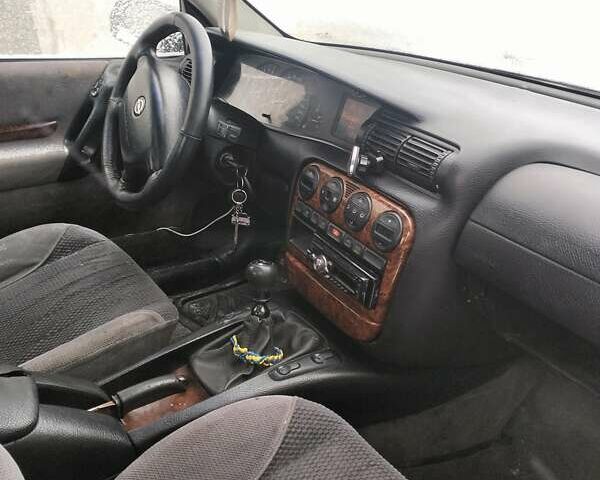 Сірий Опель Омега, об'ємом двигуна 2 л та пробігом 440 тис. км за 2250 $, фото 8 на Automoto.ua