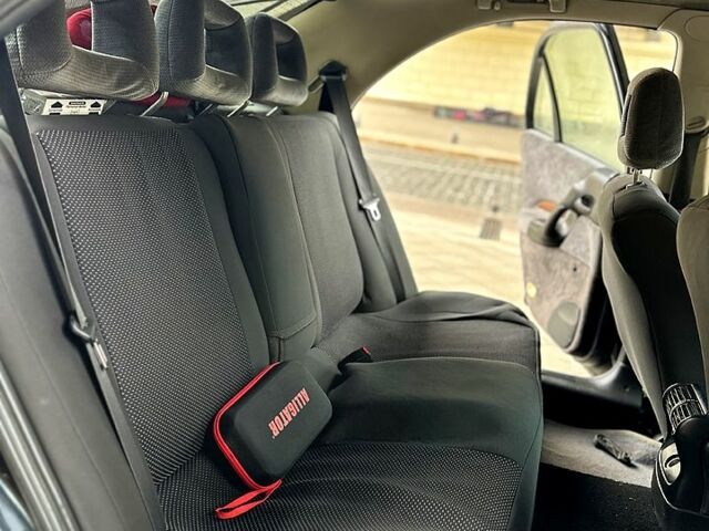 Сірий Опель Омега, об'ємом двигуна 2.5 л та пробігом 270 тис. км за 1600 $, фото 9 на Automoto.ua