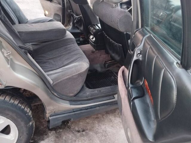 Сірий Опель Омега, об'ємом двигуна 2.6 л та пробігом 360 тис. км за 1650 $, фото 7 на Automoto.ua