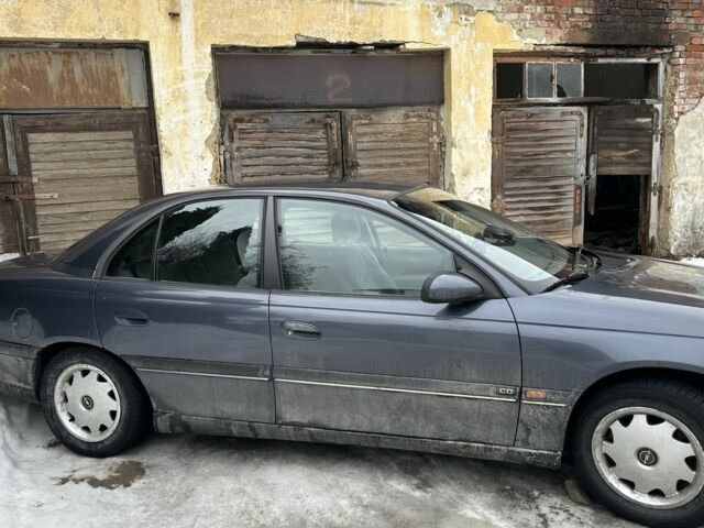 Серый Опель Омега, объемом двигателя 2.5 л и пробегом 230 тыс. км за 1600 $, фото 1 на Automoto.ua