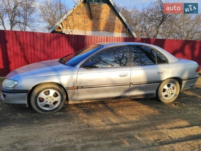 Серый Опель Омега, объемом двигателя 2 л и пробегом 256 тыс. км за 2000 $, фото 2 на Automoto.ua