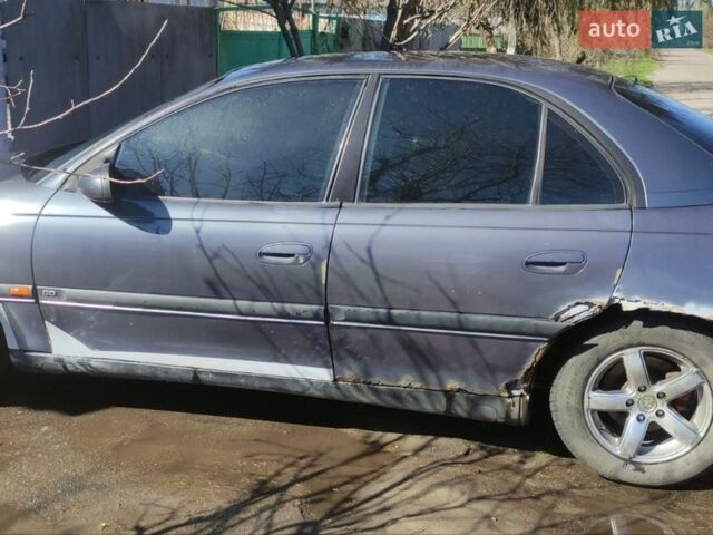 Серый Опель Омега, объемом двигателя 2 л и пробегом 350 тыс. км за 1147 $, фото 4 на Automoto.ua