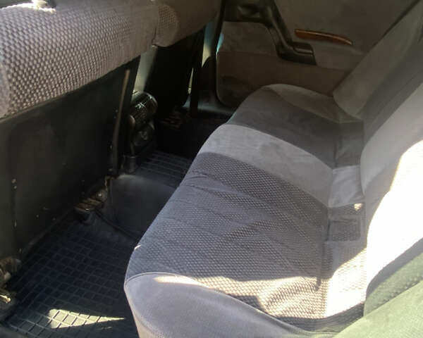 Сірий Опель Омега, об'ємом двигуна 2 л та пробігом 417 тис. км за 2699 $, фото 9 на Automoto.ua