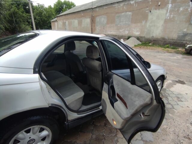 Серый Опель Омега, объемом двигателя 2.5 л и пробегом 2 тыс. км за 2499 $, фото 10 на Automoto.ua