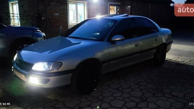 Сірий Опель Омега, об'ємом двигуна 2 л та пробігом 362 тис. км за 2450 $, фото 40 на Automoto.ua
