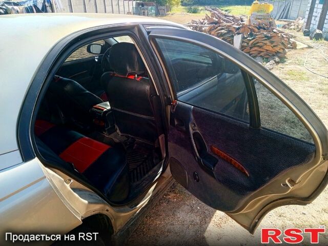 Сірий Опель Омега, об'ємом двигуна 2 л та пробігом 300 тис. км за 2500 $, фото 6 на Automoto.ua